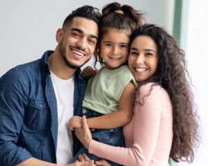 Parents With Daughter At Home