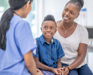 Mother and Child Meet with Doctor